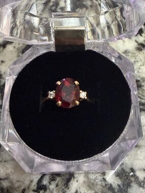 Garnet Ring with Gold Band and CZ Side Stones